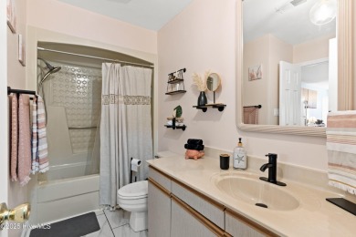The perfect blend of relaxation and opportunity, this charming on Oyster Bay Golf Links in North Carolina - for sale on GolfHomes.com, golf home, golf lot