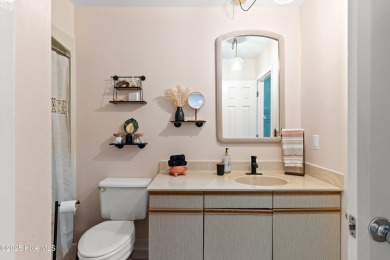 The perfect blend of relaxation and opportunity, this charming on Oyster Bay Golf Links in North Carolina - for sale on GolfHomes.com, golf home, golf lot