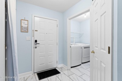 The perfect blend of relaxation and opportunity, this charming on Oyster Bay Golf Links in North Carolina - for sale on GolfHomes.com, golf home, golf lot