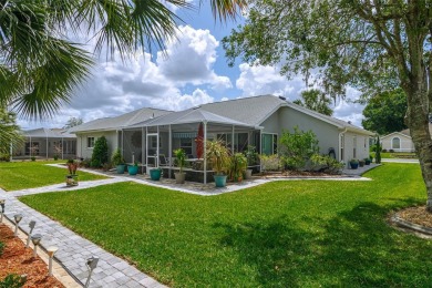 OUTSTANDING GOLF COURSE VIEW WITH GOLF CART GARAGE! This house on Ocala Palms Golf and Country Club in Florida - for sale on GolfHomes.com, golf home, golf lot