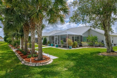 OUTSTANDING GOLF COURSE VIEW WITH GOLF CART GARAGE! This house on Ocala Palms Golf and Country Club in Florida - for sale on GolfHomes.com, golf home, golf lot