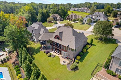 Step into a world where timeless European elegance meets on Woodfin Ridge Golf Club in South Carolina - for sale on GolfHomes.com, golf home, golf lot