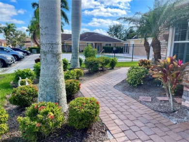 Under contract-accepting backup offers. Stunning end unit, 3/2/2 on Bobcat Trail Golf Club in Florida - for sale on GolfHomes.com, golf home, golf lot