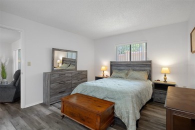 Come home to relaxed Florida living in a beautifully cared-for on Beacon Woods Golf Club in Florida - for sale on GolfHomes.com, golf home, golf lot