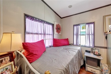 OFFERS WELCOME! This charming two-bedroom, one-bath home is on Island Dunes Country Club in Florida - for sale on GolfHomes.com, golf home, golf lot