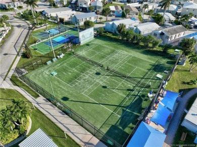 OFFERS WELCOME! This charming two-bedroom, one-bath home is on Island Dunes Country Club in Florida - for sale on GolfHomes.com, golf home, golf lot