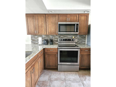 A welcoming Updated Villa on the Golf Course is for sale now in on Seven Springs Golf and Country Club in Florida - for sale on GolfHomes.com, golf home, golf lot