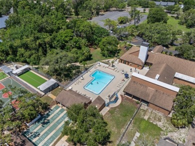 Come home to relaxed Florida living in a beautifully cared-for on Beacon Woods Golf Club in Florida - for sale on GolfHomes.com, golf home, golf lot