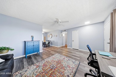 Welcome to easy Desert Living with a Front-row seat to the on Sun City Lakes West and East in Arizona - for sale on GolfHomes.com, golf home, golf lot