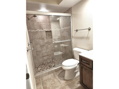 A welcoming Updated Villa on the Golf Course is for sale now in on Seven Springs Golf and Country Club in Florida - for sale on GolfHomes.com, golf home, golf lot