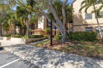 Under contract-accepting backup offers. Stylish 2BR/1BA Condo in on Feather Sound Country Club in Florida - for sale on GolfHomes.com, golf home, golf lot