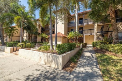 Under contract-accepting backup offers. Stylish 2BR/1BA Condo in on Feather Sound Country Club in Florida - for sale on GolfHomes.com, golf home, golf lot