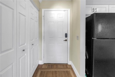 Under contract-accepting backup offers. Stylish 2BR/1BA Condo in on Feather Sound Country Club in Florida - for sale on GolfHomes.com, golf home, golf lot