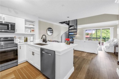 Under contract-accepting backup offers. Stylish 2BR/1BA Condo in on Feather Sound Country Club in Florida - for sale on GolfHomes.com, golf home, golf lot