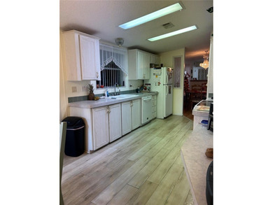 Park East is an age 55+ Resident Owned Cooperative (Co-op) on Polo Park East in Florida - for sale on GolfHomes.com, golf home, golf lot