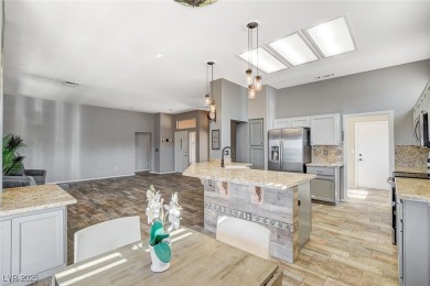 Hard-to-find gem! This 2 Bedroom + DEN, 2 Bath, 2 CAR on Highland Falls Golf Club in Nevada - for sale on GolfHomes.com, golf home, golf lot