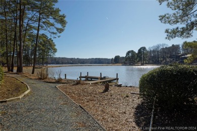 This elegant custom built home is an oasis! Nestled on the on Carolina Trace Country Club in North Carolina - for sale on GolfHomes.com, golf home, golf lot