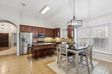 This beautiful single-story home in Hidden Cove is located just on Frisco Lakes Golf Course in Texas - for sale on GolfHomes.com, golf home, golf lot