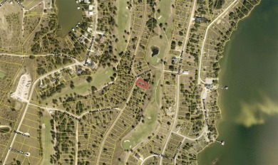 Lot 59 in Feather Bay Subdivision Phase II is a .26 acre lot on Hideout Golf Club and Resort  in Texas - for sale on GolfHomes.com, golf home, golf lot