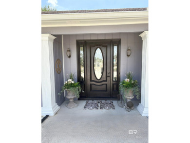 Ever dream of living on Marina Road? This single-story home on Orange Beach Golf Center in Alabama - for sale on GolfHomes.com, golf home, golf lot