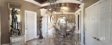 Ever dream of living on Marina Road? This single-story home on Orange Beach Golf Center in Alabama - for sale on GolfHomes.com, golf home, golf lot
