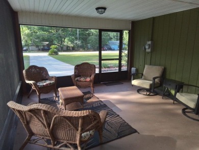 Don't miss this one! Beautifully shaded, freshly painted, well on Wildwood Country Club in Florida - for sale on GolfHomes.com, golf home, golf lot