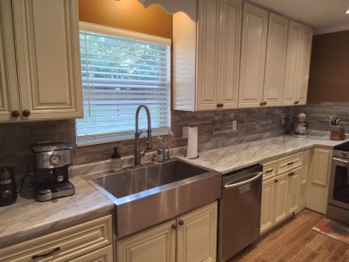 Don't miss this one! Beautifully shaded, freshly painted, well on Wildwood Country Club in Florida - for sale on GolfHomes.com, golf home, golf lot
