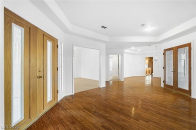 *Discover refined single-story luxury, ideally positioned on Painted Desert Golf Club in Nevada - for sale on GolfHomes.com, golf home, golf lot