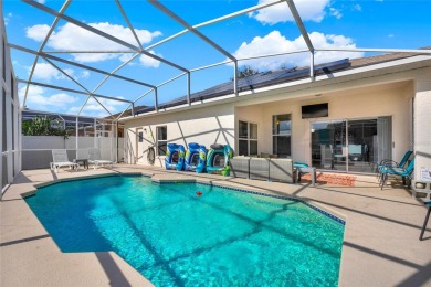 Welcome to this beautiful 4-bedroom, 2-bath, heated pool home on Polo Park East in Florida - for sale on GolfHomes.com, golf home, golf lot