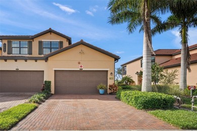 Please enjoy this beautifully upgraded first floor end unit on Sarasota National Golf Club in Florida - for sale on GolfHomes.com, golf home, golf lot