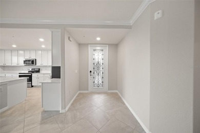 Please enjoy this beautifully upgraded first floor end unit on Sarasota National Golf Club in Florida - for sale on GolfHomes.com, golf home, golf lot
