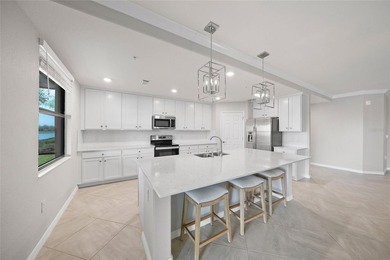Please enjoy this beautifully upgraded first floor end unit on Sarasota National Golf Club in Florida - for sale on GolfHomes.com, golf home, golf lot