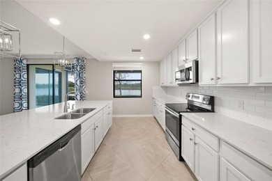 Please enjoy this beautifully upgraded first floor end unit on Sarasota National Golf Club in Florida - for sale on GolfHomes.com, golf home, golf lot