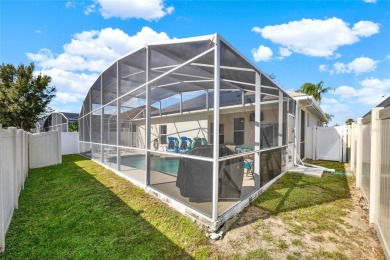 Welcome to this beautiful 4-bedroom, 2-bath, heated pool home on Polo Park East in Florida - for sale on GolfHomes.com, golf home, golf lot