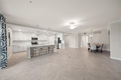 Please enjoy this beautifully upgraded first floor end unit on Sarasota National Golf Club in Florida - for sale on GolfHomes.com, golf home, golf lot