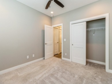 Enjoy panoramic views of Hole #10 at the Indianola Golf Club on Indianola Golf and Country Club in Iowa - for sale on GolfHomes.com, golf home, golf lot