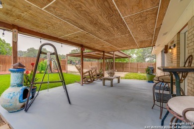 Welcome to your dream home in a quiet neighborhood just a on Devine Golf Course in Texas - for sale on GolfHomes.com, golf home, golf lot