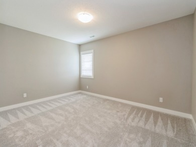 Enjoy panoramic views of Hole #10 at the Indianola Golf Club on Indianola Golf and Country Club in Iowa - for sale on GolfHomes.com, golf home, golf lot