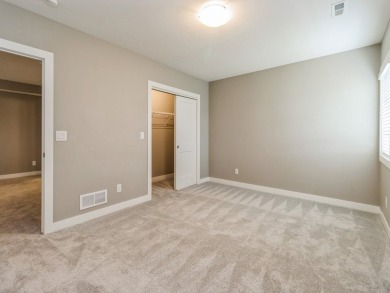 Enjoy panoramic views of Hole #10 at the Indianola Golf Club on Indianola Golf and Country Club in Iowa - for sale on GolfHomes.com, golf home, golf lot