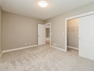 Enjoy panoramic views of Hole #10 at the Indianola Golf Club on Indianola Golf and Country Club in Iowa - for sale on GolfHomes.com, golf home, golf lot