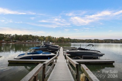 Experience waterfront luxury  long-range golf views from this on Trump National Golf Club Charlotte in North Carolina - for sale on GolfHomes.com, golf home, golf lot