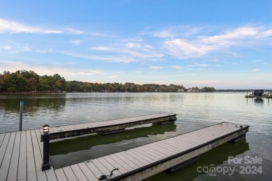 Experience waterfront luxury  long-range golf views from this on Trump National Golf Club Charlotte in North Carolina - for sale on GolfHomes.com, golf home, golf lot