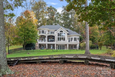 Experience waterfront luxury  long-range golf views from this on Trump National Golf Club Charlotte in North Carolina - for sale on GolfHomes.com, golf home, golf lot