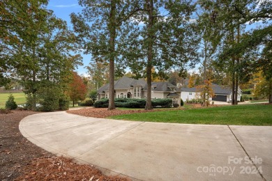 Experience waterfront luxury  long-range golf views from this on Trump National Golf Club Charlotte in North Carolina - for sale on GolfHomes.com, golf home, golf lot