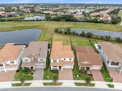 Positioned on one of the most desirable pond and golf view lots on Eagle Creek Golf Club in Florida - for sale on GolfHomes.com, golf home, golf lot
