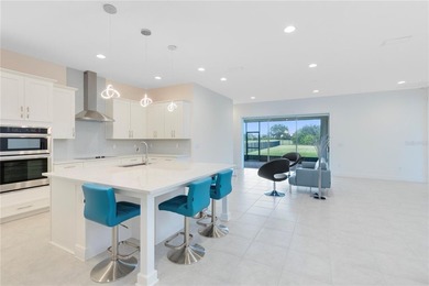 Positioned on one of the most desirable pond and golf view lots on Eagle Creek Golf Club in Florida - for sale on GolfHomes.com, golf home, golf lot