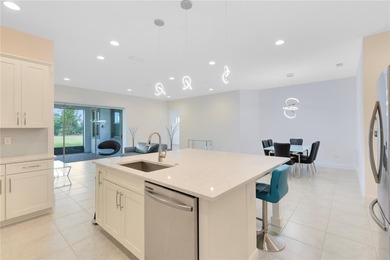 Positioned on one of the most desirable pond and golf view lots on Eagle Creek Golf Club in Florida - for sale on GolfHomes.com, golf home, golf lot