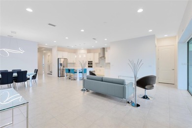 Positioned on one of the most desirable pond and golf view lots on Eagle Creek Golf Club in Florida - for sale on GolfHomes.com, golf home, golf lot