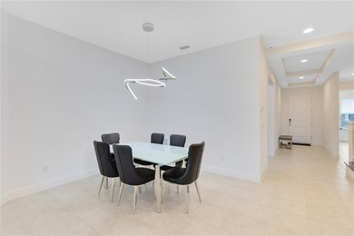 Positioned on one of the most desirable pond and golf view lots on Eagle Creek Golf Club in Florida - for sale on GolfHomes.com, golf home, golf lot