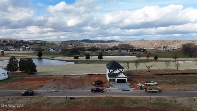 This charming lot is ideally located, backing up to a stunning on Tennessee National Golf Club in Tennessee - for sale on GolfHomes.com, golf home, golf lot